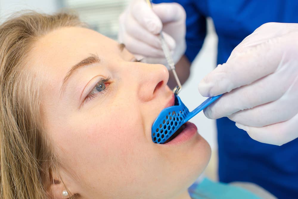 A mouth guard getting professionally fitted.