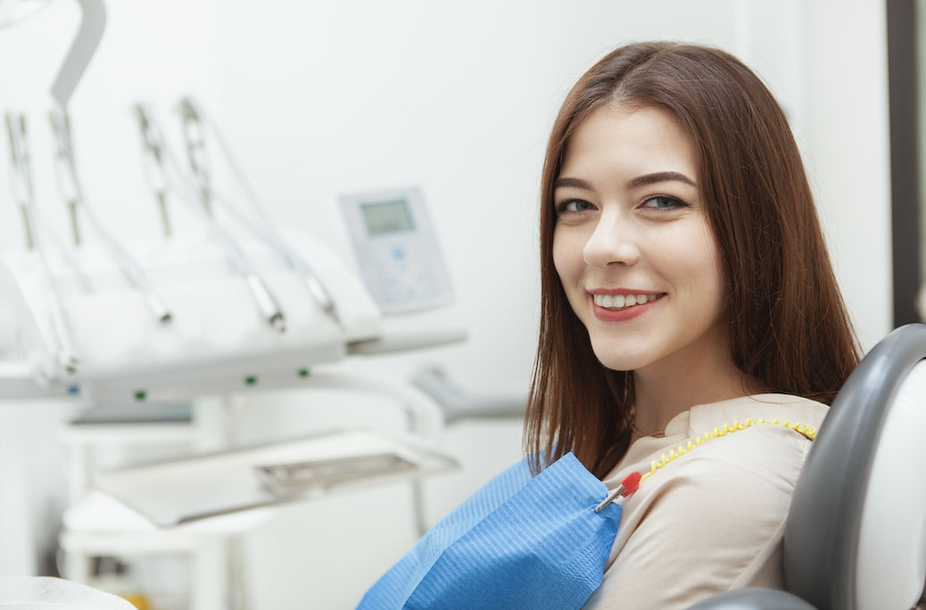 A dental patient looking reassured and comfortable in a relaxed atmosphere.