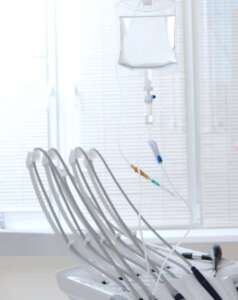 In IV sedation, the dentist administers the sedative through an IV line hooked to a vein in your arm.