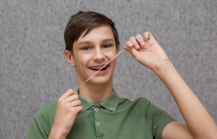 Proper brushing and flossing during orthodontic treatment are important.
