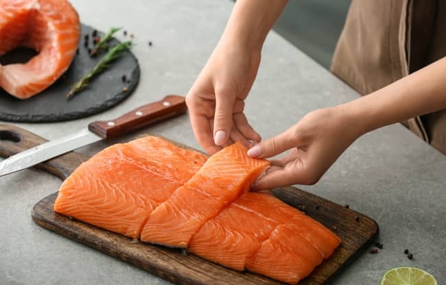 Fatty fish like salmon and mackerel are high in omega-3 fatty acids, which can help reduce inflammation and gum disease.