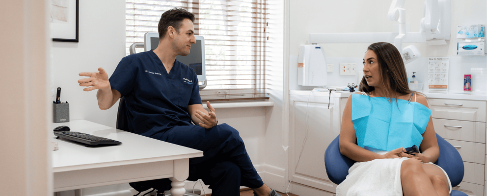 Dentist performing a dental check-up and clean at Chelmsford Dental Mount Lawley