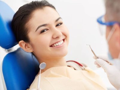 patient smiling, after dental consultation.