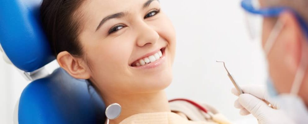 patient smiling, after dental consultation.