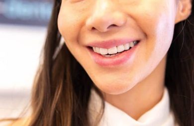 lady smiling after having teeth whitening service